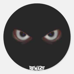 STICKER ROND ATTENTION AUX YEUX MAUVAIS