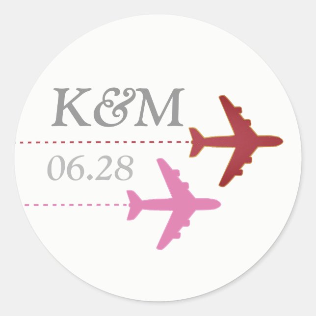 Sticker Rond avions roses et rouges sur blanc + initiales, voya (Devant)