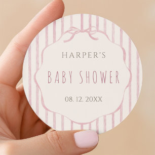 Sticker Rond Baby Shower avec rayures roses et cadre festonné 