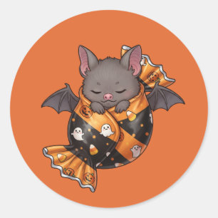 Sticker Rond Bat enrobé dans le bonbon d'Halloween
