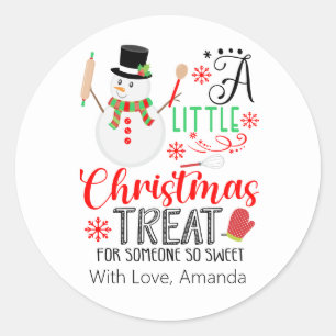 Sticker Rond Bonhomme de neige préparant une petite friandise d