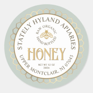 Sticker Rond Bordure et abeilles en peigne de miel vert or
