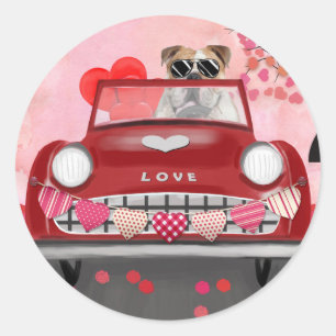 Sticker Rond Bouledogue anglais conduisant une voiture avec des