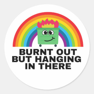 Sticker Rond Brûlé mais accroché à la feuille de l'autocollant