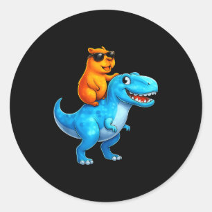 Sticker Rond Capybara Drôle Équitant un Dinosaure, Équitant Din