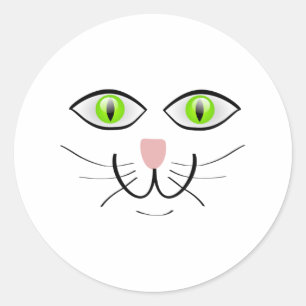Sticker Rond Caricature du visage de chat à l'oeil vert