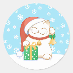 Sticker Rond Chat de Noël blanc dans un Casquette rouge