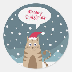 Sticker Rond Chat de Noël en paysage enneigé voeux vacances