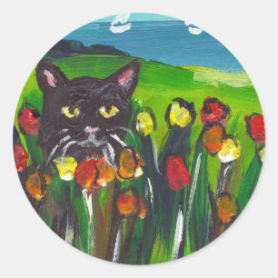 Sticker Rond Chat noir au milieu des tulipes