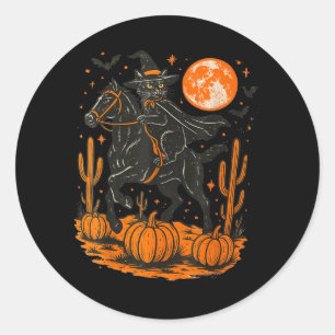 Sticker Rond Chat noir de sorcière montant un cheval Halloween