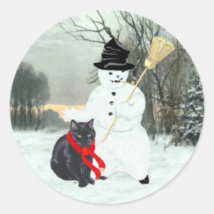 Sticker Rond Chat noir et bonhomme de neige