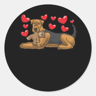 Sticker Rond Chien Airedale Terrier Avec Animal Stuffé