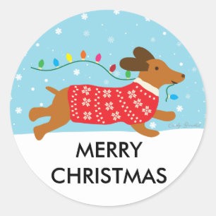 Sticker Rond Chien de Dachshund dans la neige Joyeux Noël