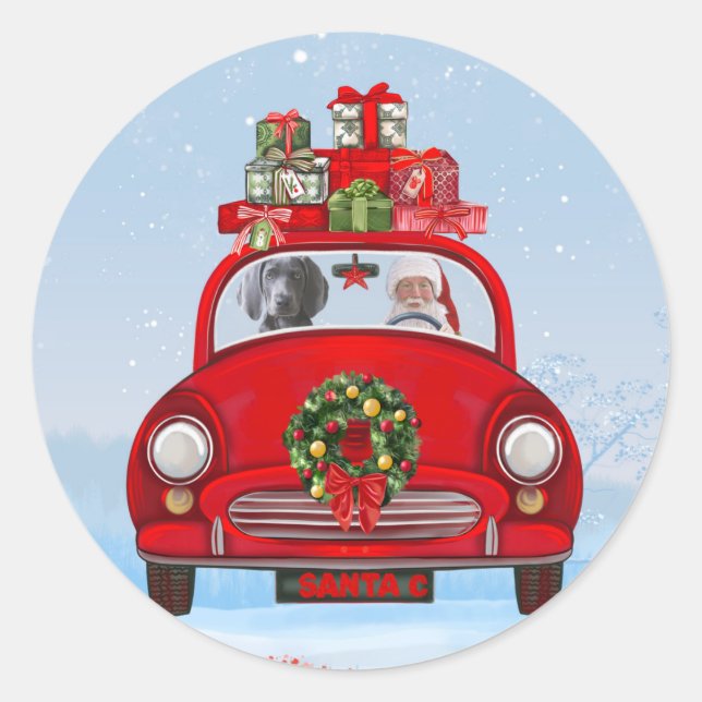 Sticker Rond Chien Weimaraner En Voiture Avec Le Père Noël (Devant)