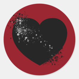 Sticker Rond Coeur noir éclaboussé d'encre.