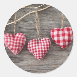 Sticker Rond Coeurs rouges sur le Tableau en bois