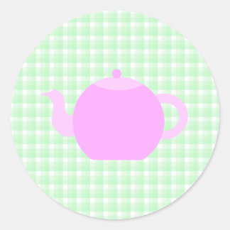 Sticker Rond Conception de théière rose sur chèque vert.