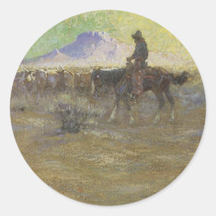 Sticker Rond Cowboy menant du bétail dans l'ouest américain par