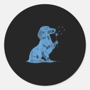 Sticker Rond Dachshund soufflant des vœux sur un pissenlit amou