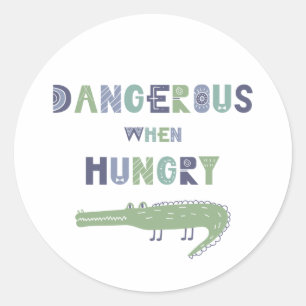Sticker Rond Dangereux quand affamé bébé alligator