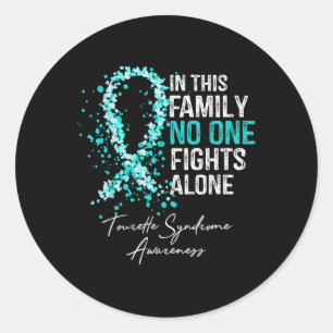 Sticker Rond Dans cette famille combat seul Chemise Tourette Sy