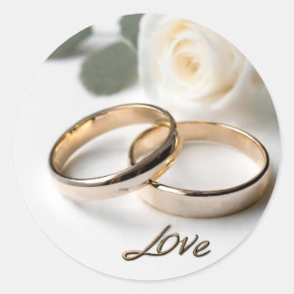 Sticker Rond Deux bagues mariages sur satin avec amour