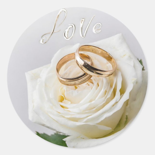 Sticker Rond Deux bagues mariages sur une rose blanche (Devant)