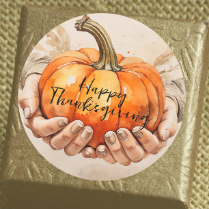 Sticker Rond Deux mains doucement tenir un Thanksgiving Citroui