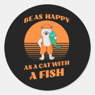 Sticker Rond Drôle chat heureux tenant un poisson. Funny Feline