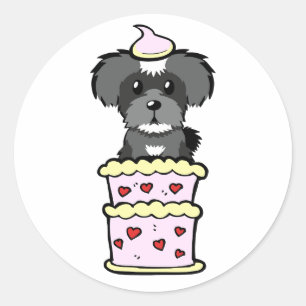 Sticker Rond Drôle chien schnauzer sautant d'un gâteau
