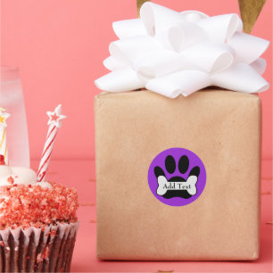 Sticker Rond Empreinte de patte De Chien Et Os Sur Violet Clair