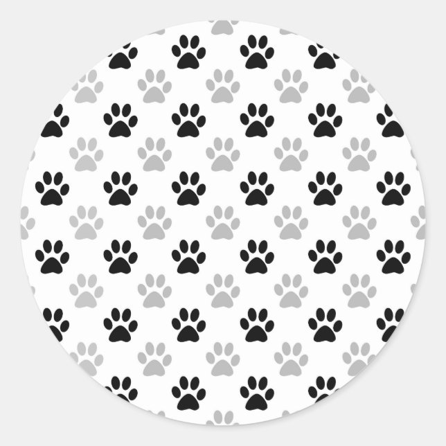 Sticker Rond Empreintes de pattes de chiots noirs et blancs (Devant)