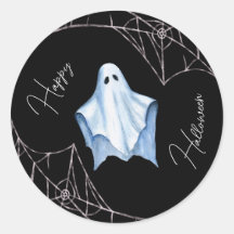 Fantôme de drap blanc et toiles d'araignée noires 