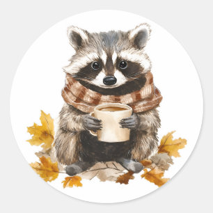 Sticker Rond Feuilles d'automne confortable raccoon avec tasse 