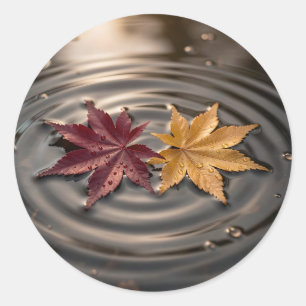 Sticker Rond Feuilles d'érable d'automne flottant sur l'eau