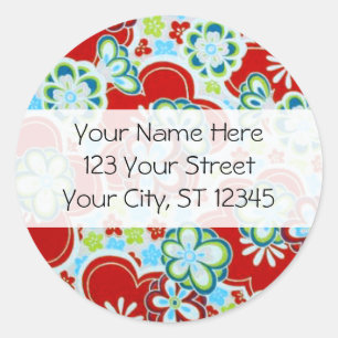 Sticker Rond Fleurs rouges, bleues, vertes et blanches