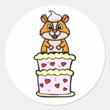 Funny Hamster sautant d'un gâteau
