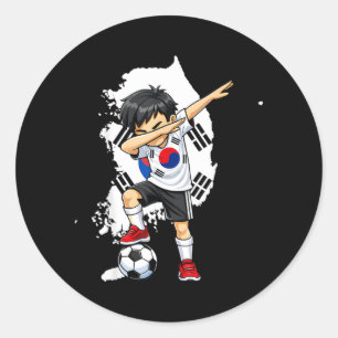 Sticker Rond Garçon de Corée du Sud faisant du dabbing avec un