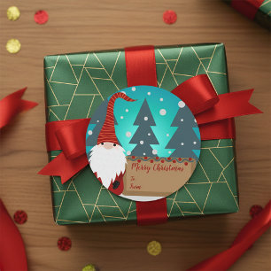 Sticker Rond Gnome dans un paysage hivernal enneigé Noël