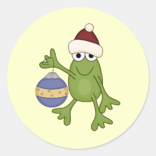 Sticker Rond Grenouille père Noël avec tee-shirts et cadeaux
