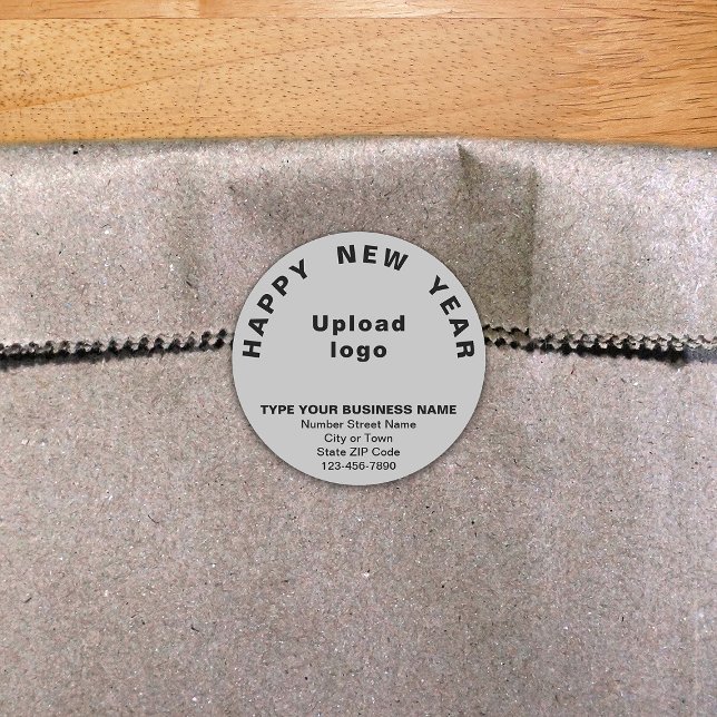 Sticker rond gris pour le Nouvel An (New Year greeting with your business brand on gray round shape sticker.)
