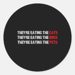 Sticker Rond Ils mangent les chiens - Ils mangent les chats
