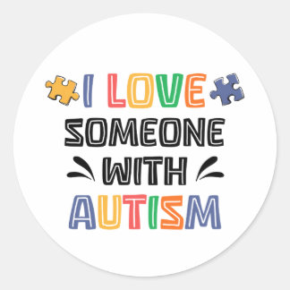 Sticker Rond J'aime quelqu'un avec l'autisme