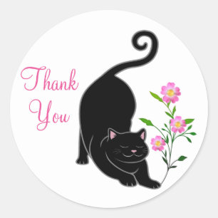Sticker Rond Joli chaton noir avec des fleurs Merci
