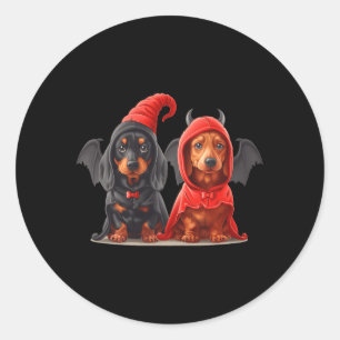 Sticker Rond Jolis chiens teckel d'Halloween en costume de diab