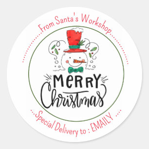 Sticker Rond Laisse-le neiger. Joyeux visage de Snowman