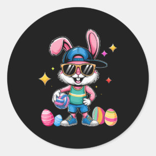 Sticker Rond Lapin de Pâques heureux jouant au volley Pâques sp