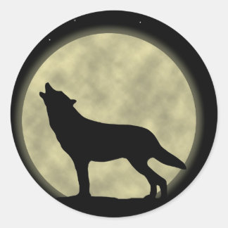 Sticker Rond Le loup hurlant dans la nuit