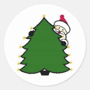 Sticker Rond Le Père Noël se cache derrière l'arbre de Noël