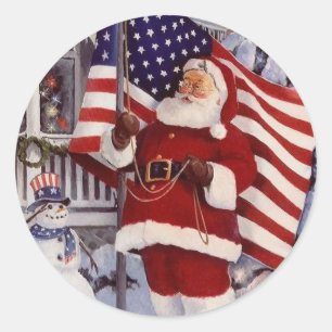 Sticker Rond Le Père Noël tient le drapeau américain
